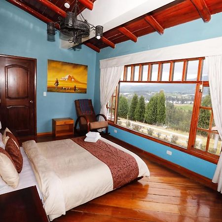 Hosteria Loma Larga Каямбе Экстерьер фото